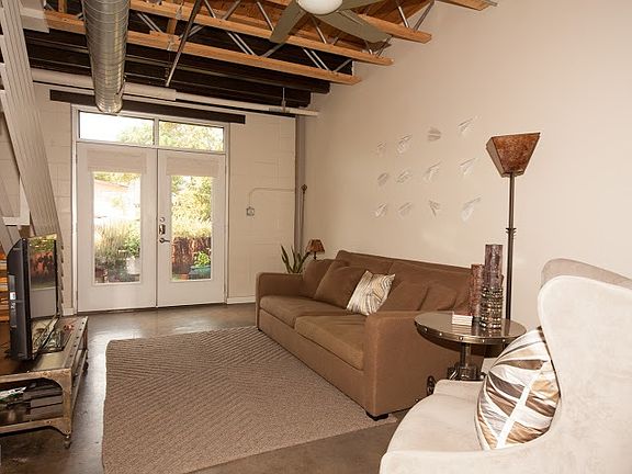 Downstairs living area looking out front door