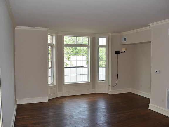 Living Room with High Ceilings and Plenty of Natural Light