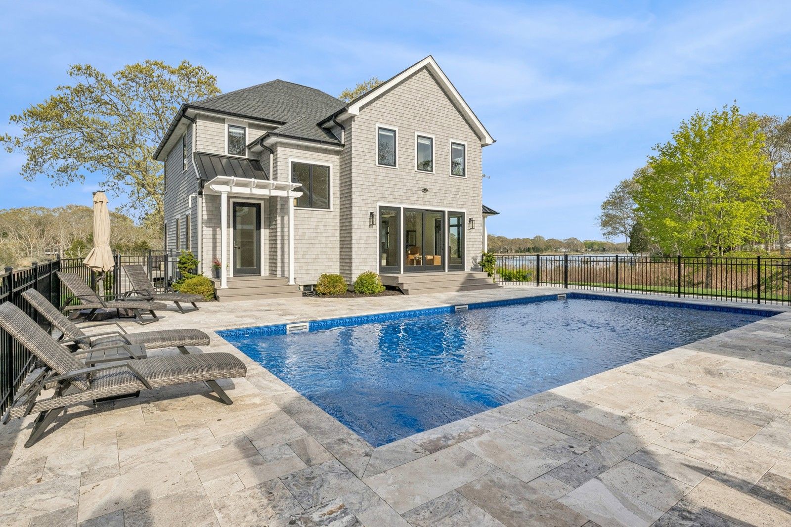  heated salt water pool with travertine patio