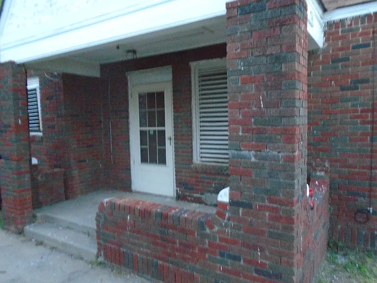 Close view of porch of 124 NW 31st Street.