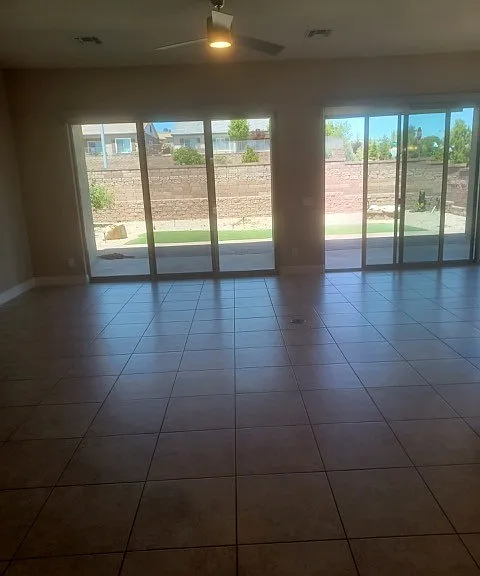 Great room - two sliders to covered patio