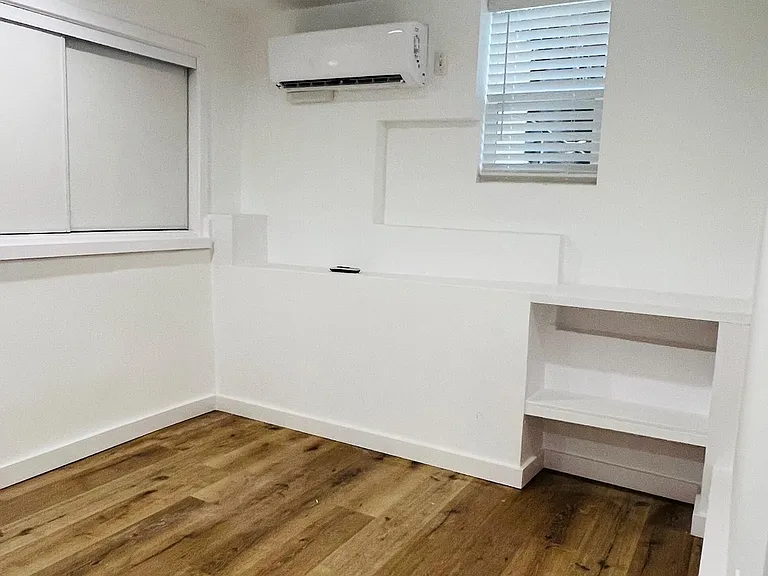 Bedroom storage on the left