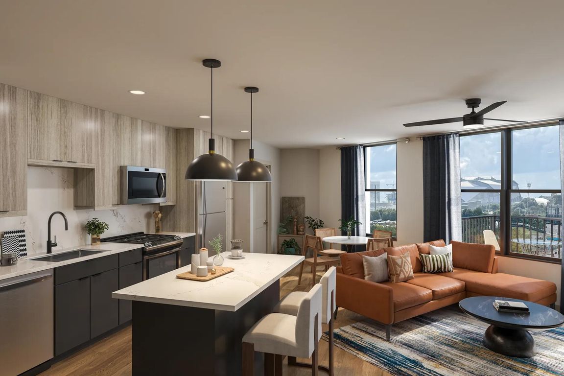 Gourmet kitchens with quartz countertops, custom cabinetry with soft close, and large chef''s island.