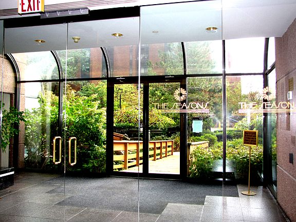 Heated swimming pool with elevator for handicap access