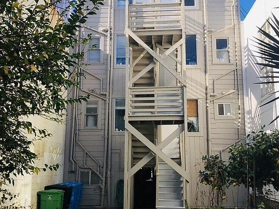 Back stairway of Shotwell 121-125. All six apartments have access to the back yard.
