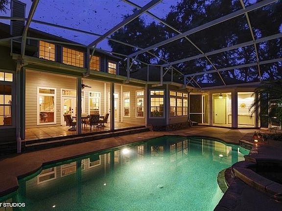 Pool/spa features a stone waterfall feature