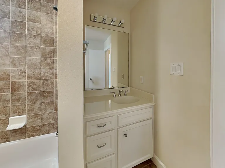 This bathroom features beige w