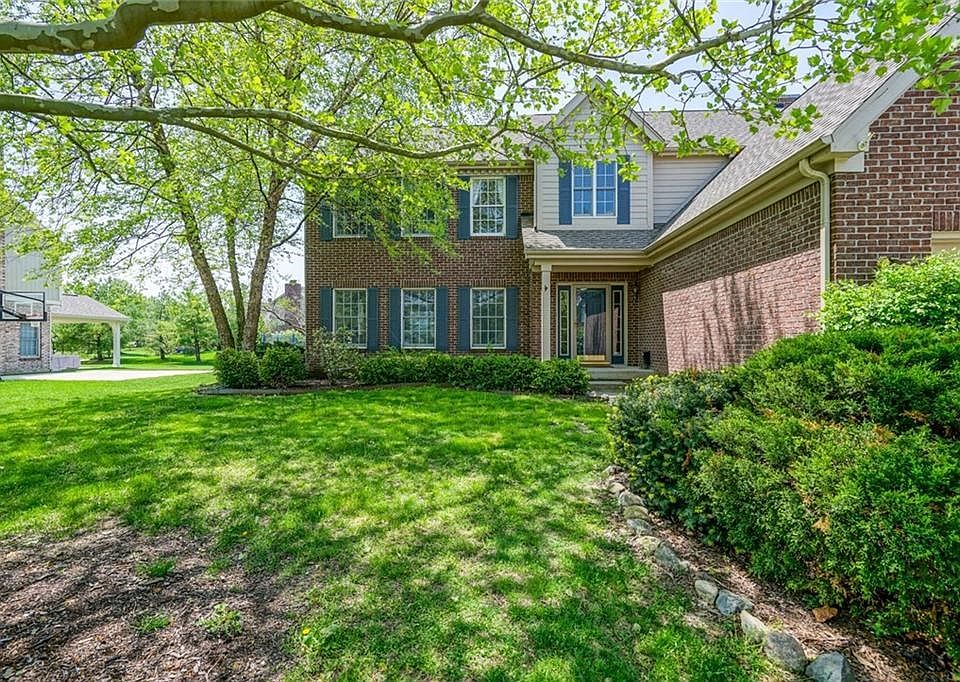 Brick Colonial with Welcoming Front Porch!