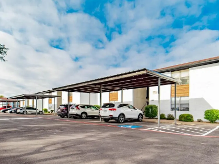 Ashton on 287 exterior, covered parking area