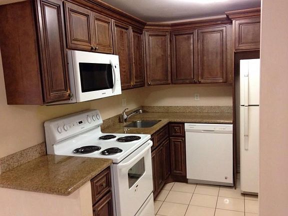 new cherry wood kitchen cabinets with granite counter tops