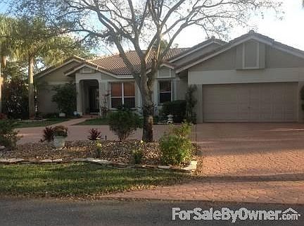 Front of house with island