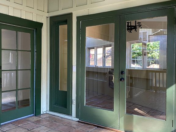 door on left French doors to dine area