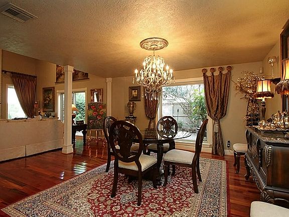 Simply elegant... The formal dining room embraces exquisite style and displays amazing views of the 