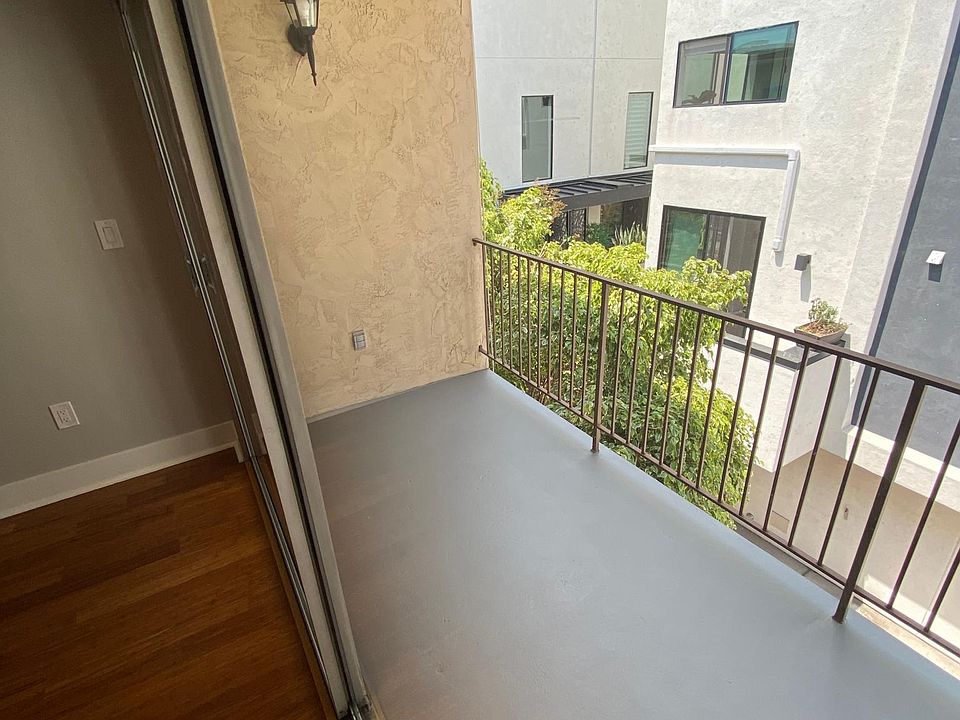 Balcony Off Living Area With Light and Outdoor Plug