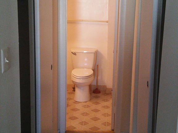 His & Hers closets & master bath