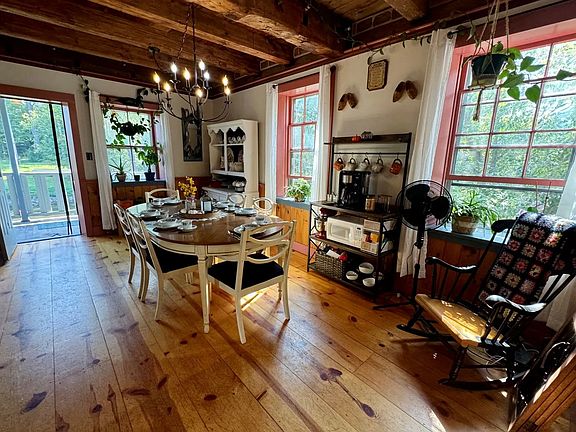 The south-facing dining room gets plenty of sunlight.