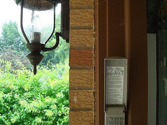 Garage keypad and motion sensing light
