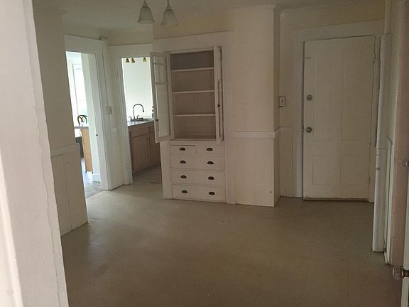 kitchen looking onto pantry/sunroom.