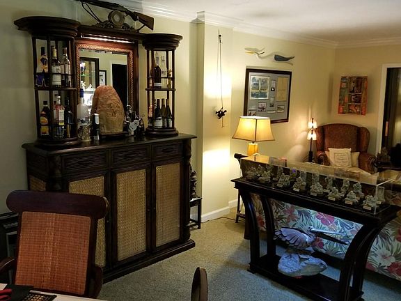 More of the "Tommy Bahama style" apartment furnishings along with art brought back from China