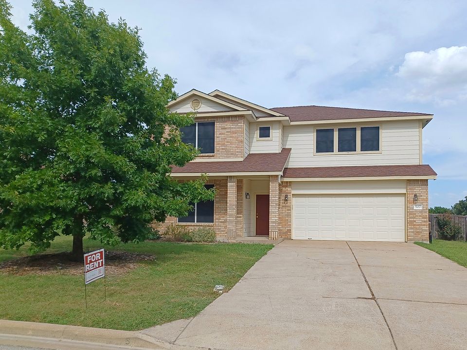 Welcoming Harker Heights rental home with covered front porch, 2-car garage, and landscaped yard _ minutes from Fort Hood and just steps from Skipcha Elementary.