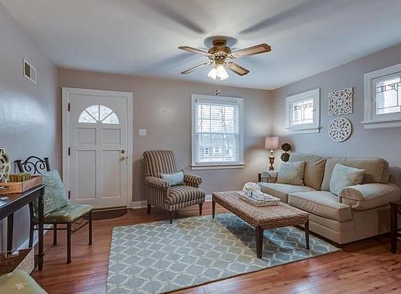 The living room has both stained glass and updated windows!