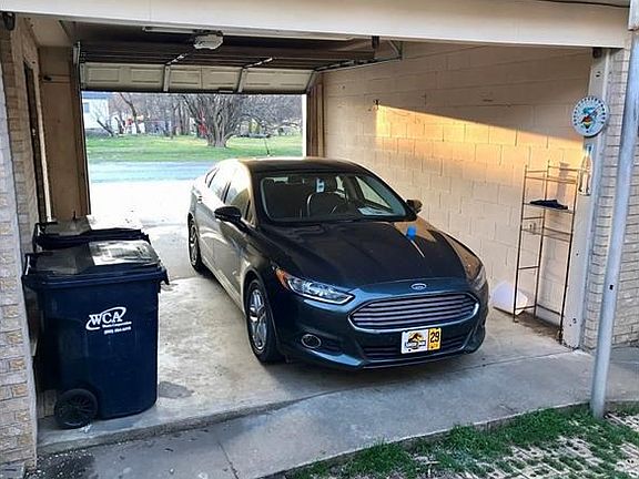 Nice garage area for 230 but could be used for 228. Nice private area courts the two homes.