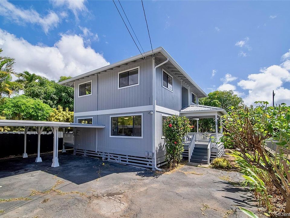 Front of house showing carport and entrance