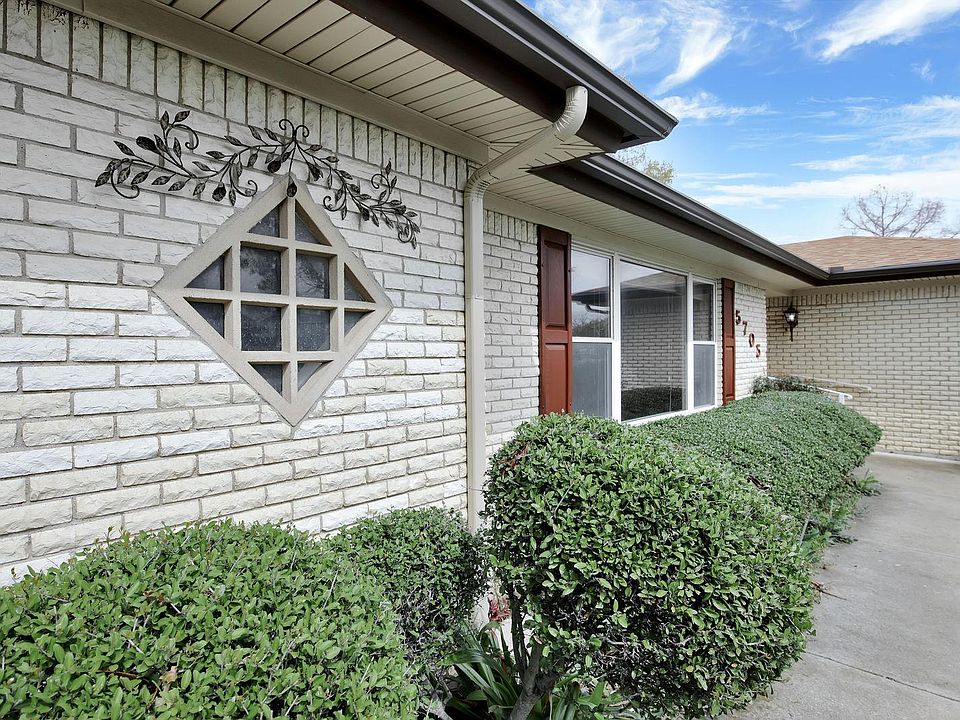Well established yard and that window is extra storage in the garage.