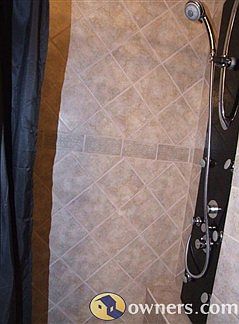 custom built walk in bath with shower tower