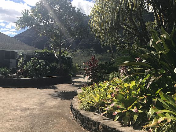 DRIVEWAY DOWN LOWER UNIT LEVEL AND THEN TO MINI FARM