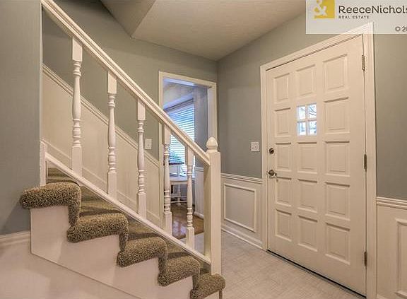 Tile and wainscoting greet you in the Entry way! Welcome Home!
