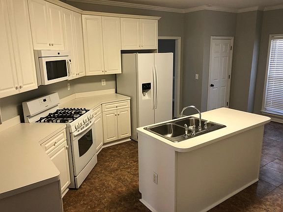Kitchen with island and breakfast area