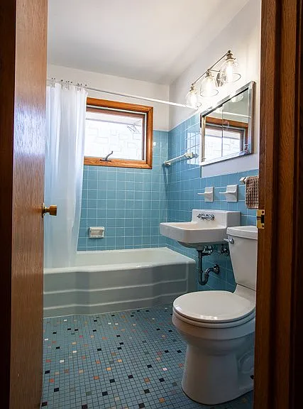 1st floor bathroom with pristine original South Minneapolis tile.