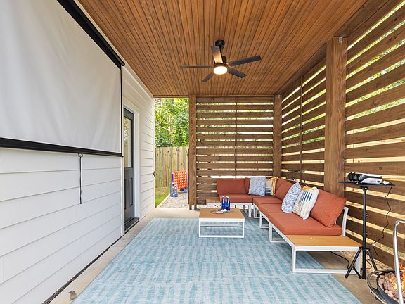 Lounge on the outdoor patio and watch a movie on the projector, rain or shine.