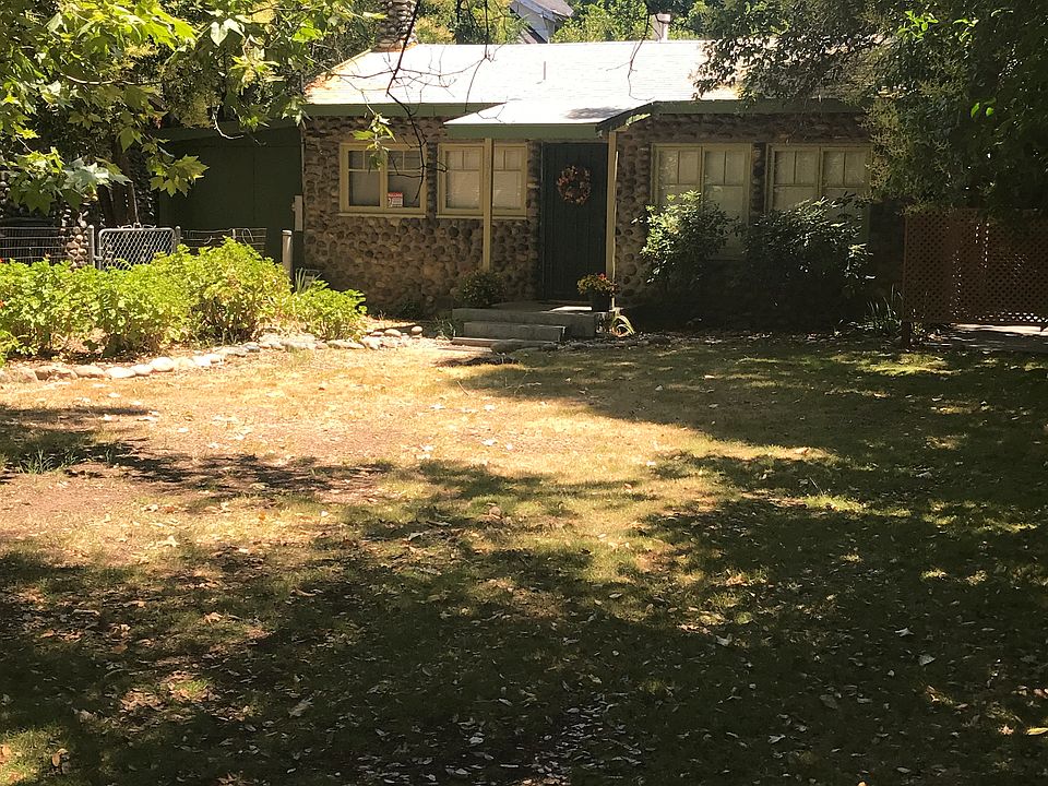 Large fenced front yard