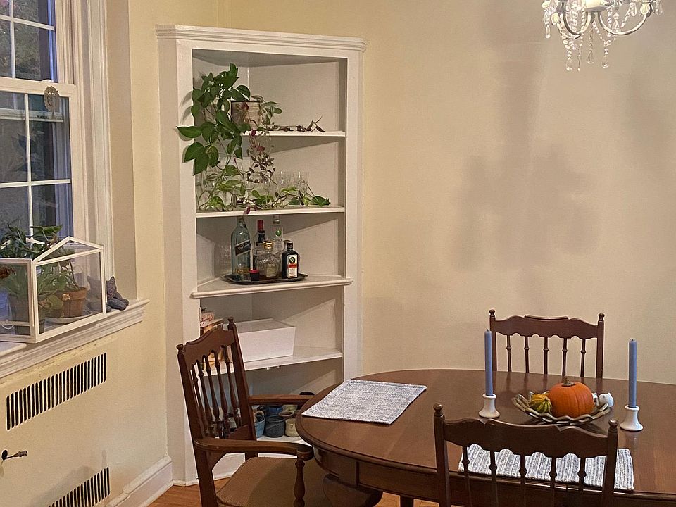 Dining room with built-in bookshelf