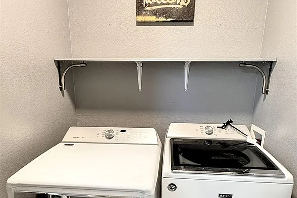 Convenient in-unit laundry room with washer and dryer. Perfect for freshening up after a day of exploring.