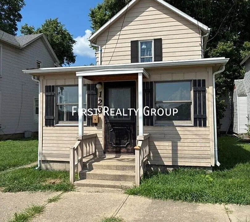 123 E 6th St