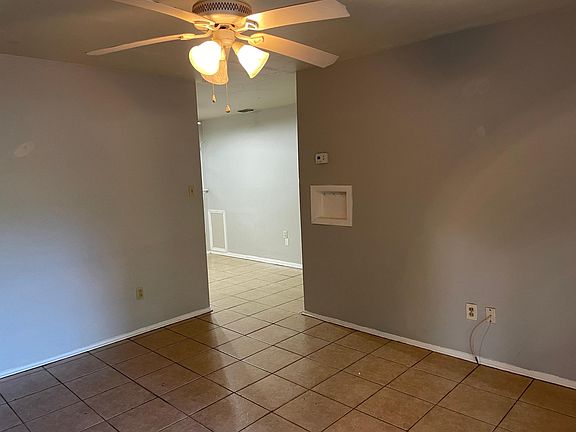 Living room leads to kitchen