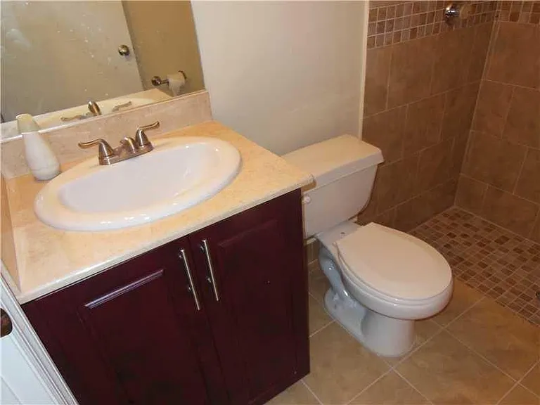 First floor updated full shower bath adjacent to first floor
