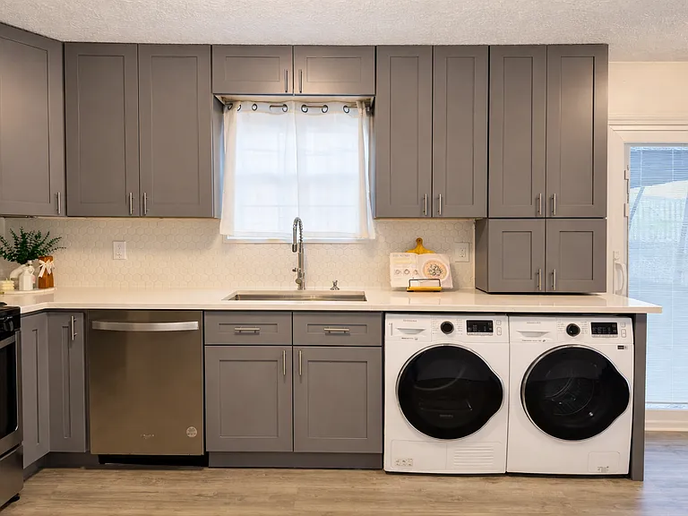 Ground floor - kitchen with new cabinets, appliances and quartz countertop