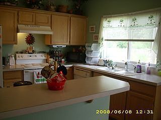 Roomy kitchen with bar