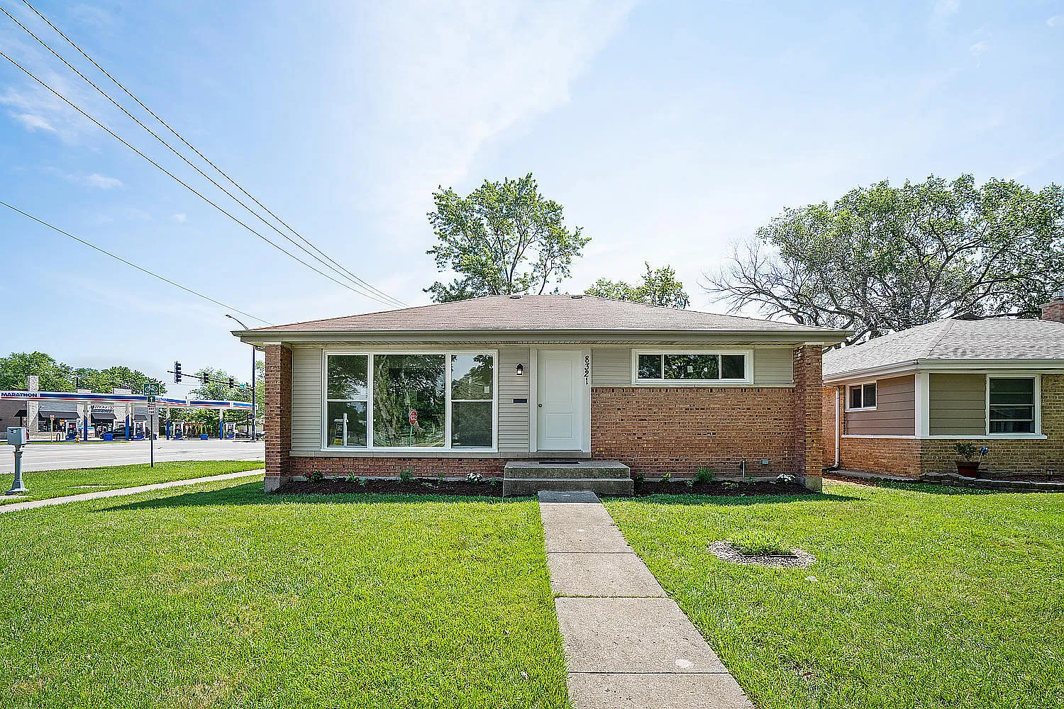 8321 N Ozanam Ave photo 1