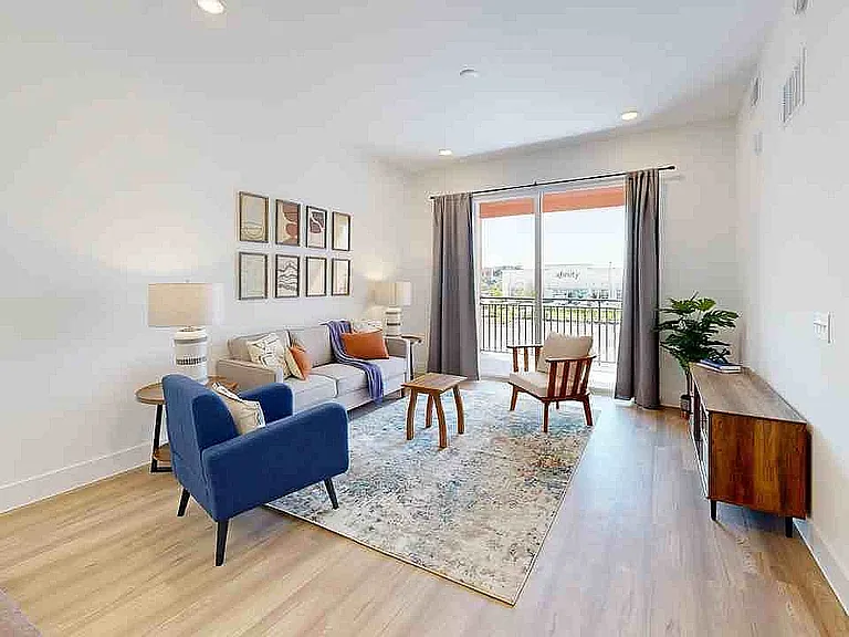 Experience the warmth and style of this contemporary living room, perfect for relaxation and entertaining.