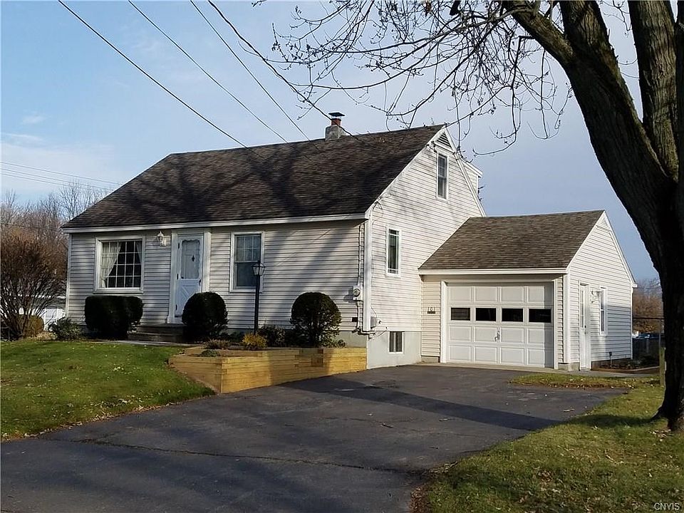 Nicely maintained Cape Cod with vinyl siding and Marvin windows.