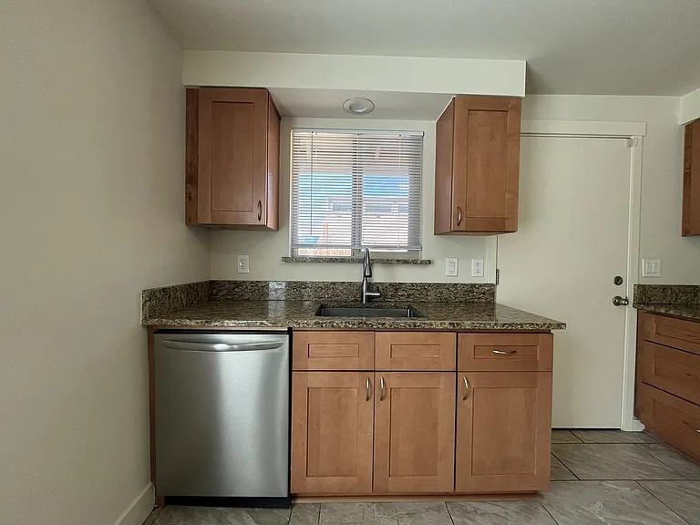 Bright and Airy Home with Stainless Steel Kitchen, Vaulted Ceilings & Washer + Dryer — Photo 20