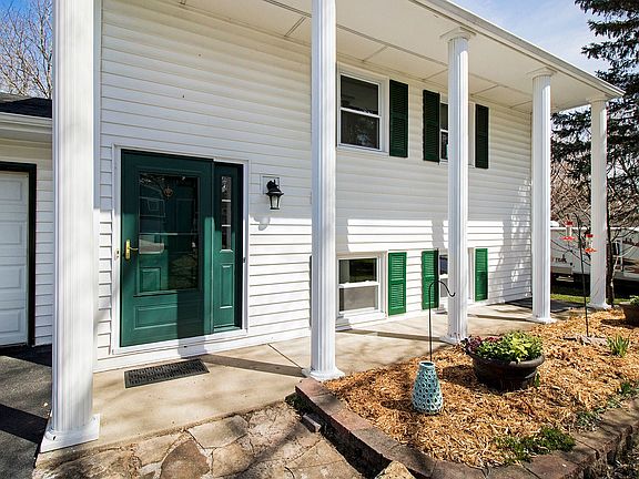 ~Freshly landscaped plus large front patio.