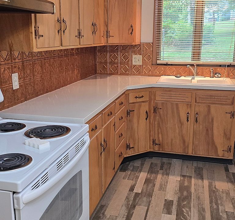 Eat in kitchen with stove and refridgerator