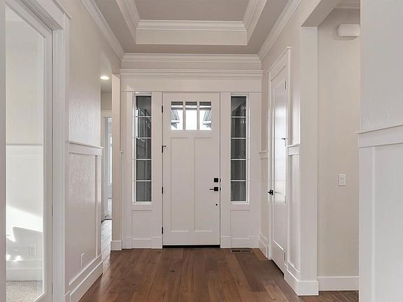 Entry with elevated ceiling hight and crown molding detail!