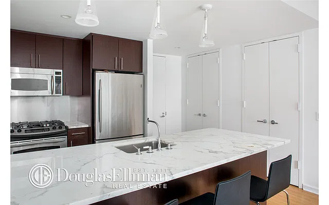 Sold by Douglas Elliman | media 12